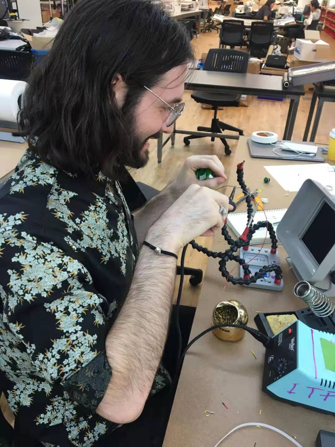 This is me learning to solder, using
      a soldering iron.