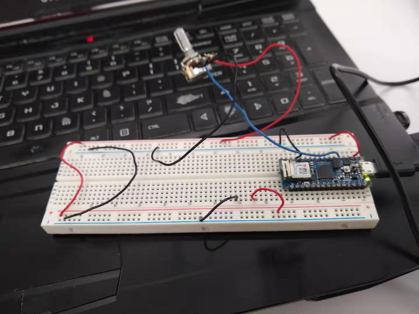 A p5 sketch being controlled by a potentiometer.